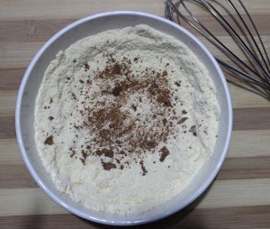 Flour mixture, cinnamon and nutmeg powder added into flour mixture