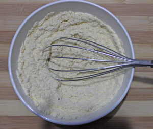 Cinnamon and nutmeg powder whisked well with flour mixture