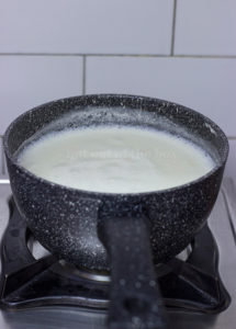 Boiling the milk in Pietra Lavica Saucepan