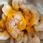 Prawns to be mixed with turmeric powder & salt